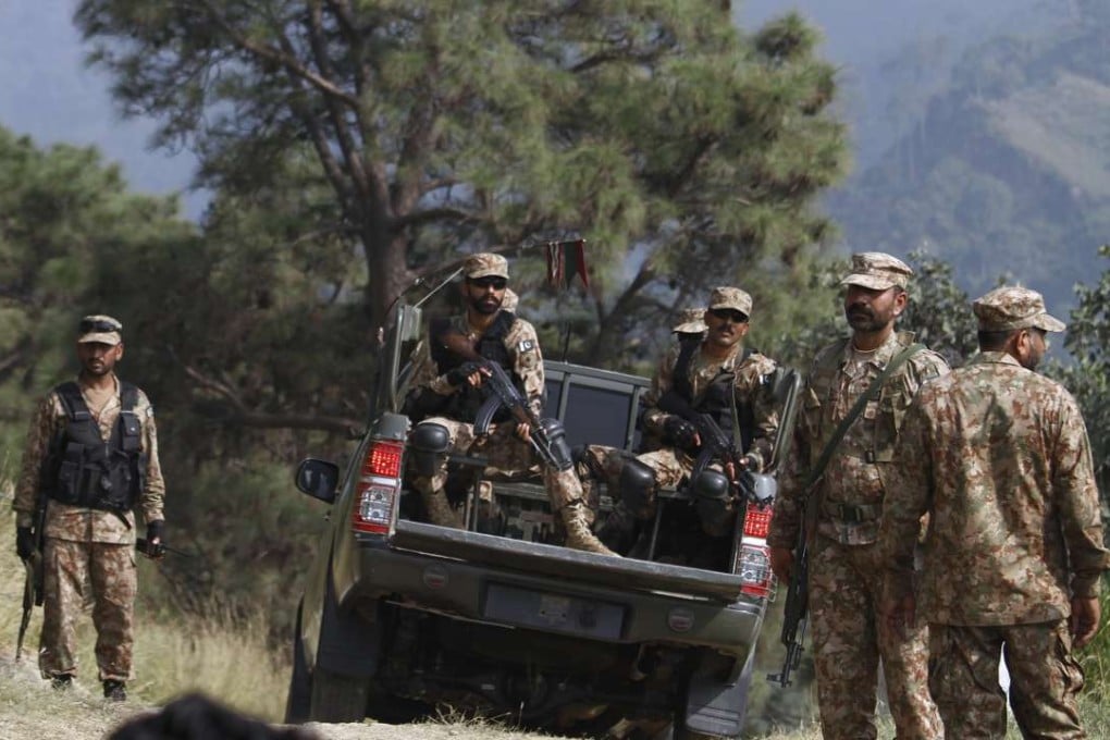 Pakistan army soldiers patrol at a forward area Bagsar post on the Line of Control (LoC). Photo: AP