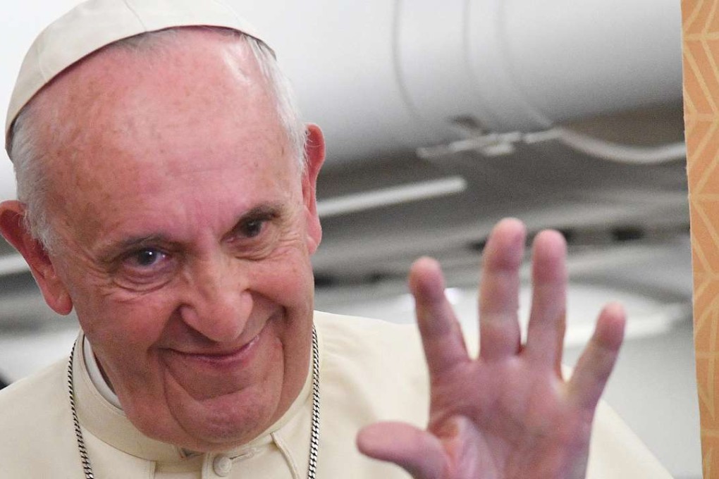 Pope Francis during his flight back from Baku to Rome. Photo: AFP