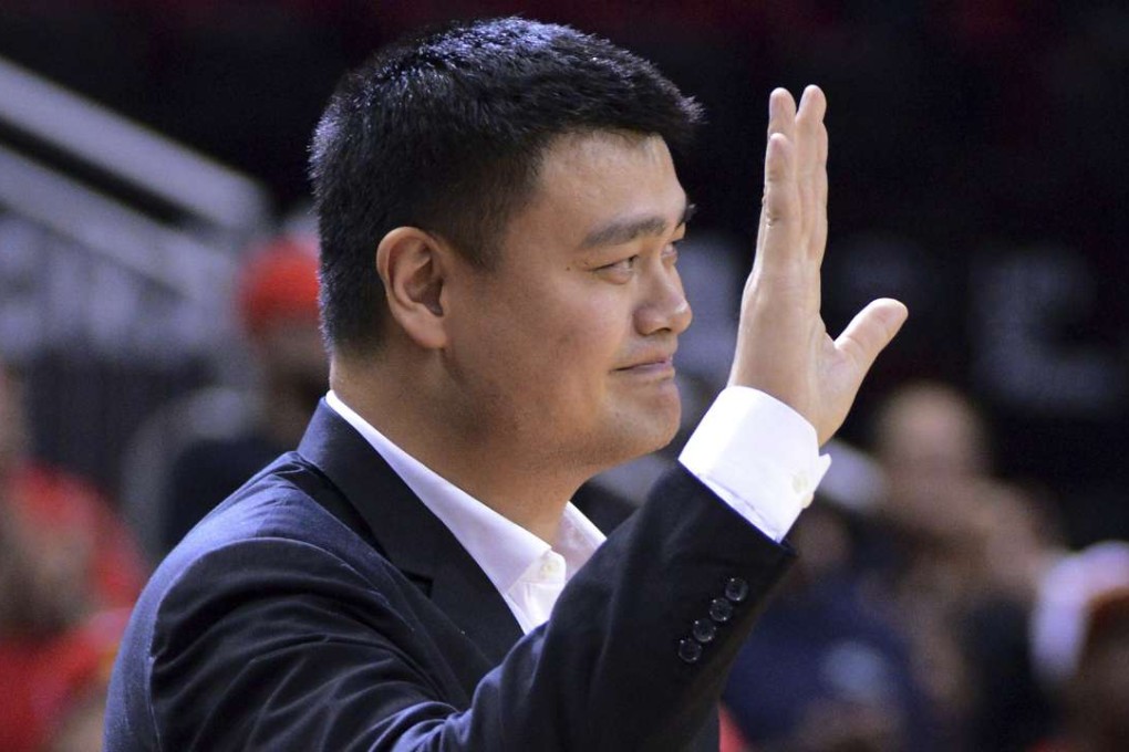 Former Houston Rocket Yao Ming is honoured during the first half of an exhibition game between Shanghai Sharks and the Rockets in Los Angeles. Photos: AP