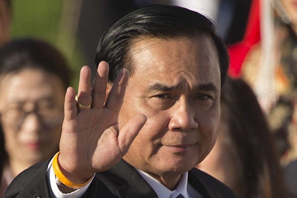 Thailand's Prime Minister Prayuth Chan-ocha waves as he arrives for a group photo of leaders at the Asia-Europe Meeting in Ulaanbaatar, Mongolia. Photo: AP