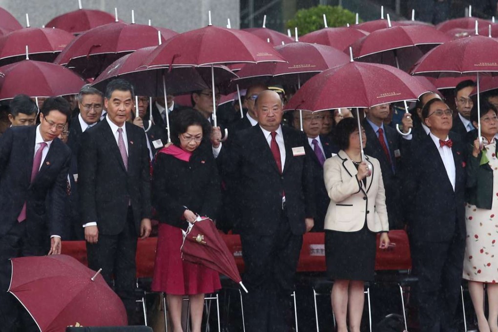 It was all down – for some – as the national anthem started up. Photo: Jonathan Wong