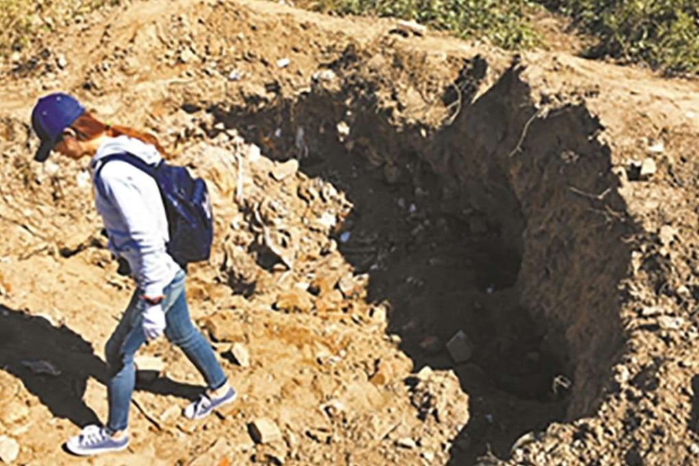 More than 20 deep holes have been dug by treasure hunters hoping to find pieces of valuable gemstones at the site of the former jade plant in Beijing. Photo: SCMP Pictures