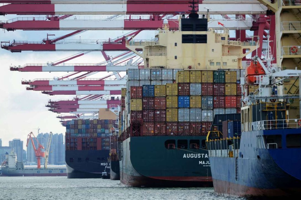 Cargo containers wait to be transported at a port in Qingdao, Shandong province. Photo: AFP
