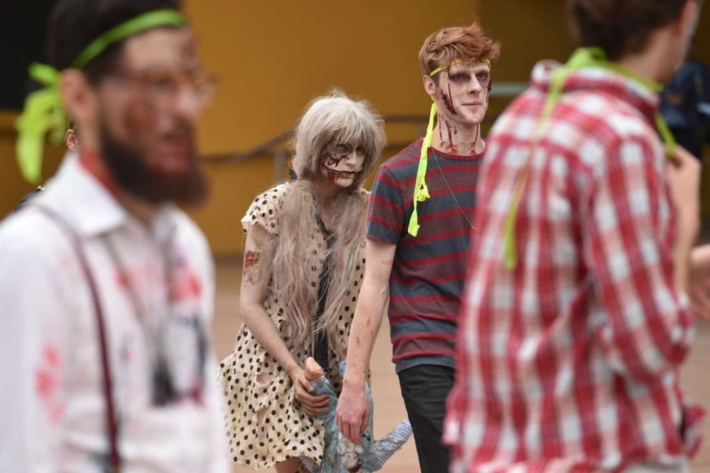 Zombies mooch around the UNSW campus looking for tasty brains of survivors to munch on in Zedtown. Photo: AFP