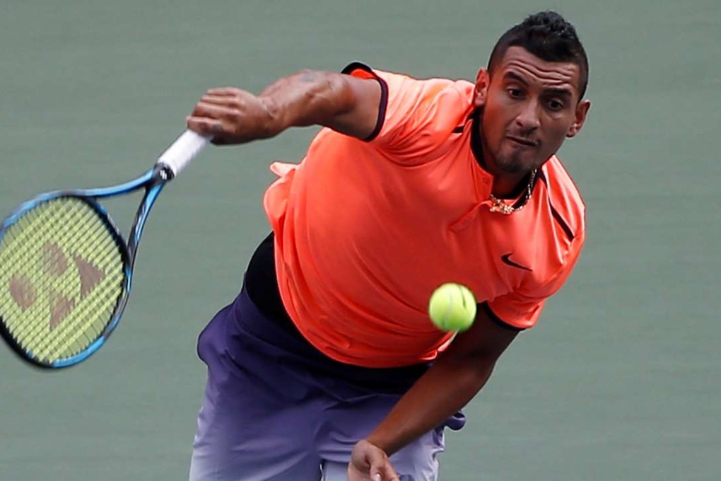 Nick Kyrgios of Australia serves against Ryan Harrison. Photo: Reuters