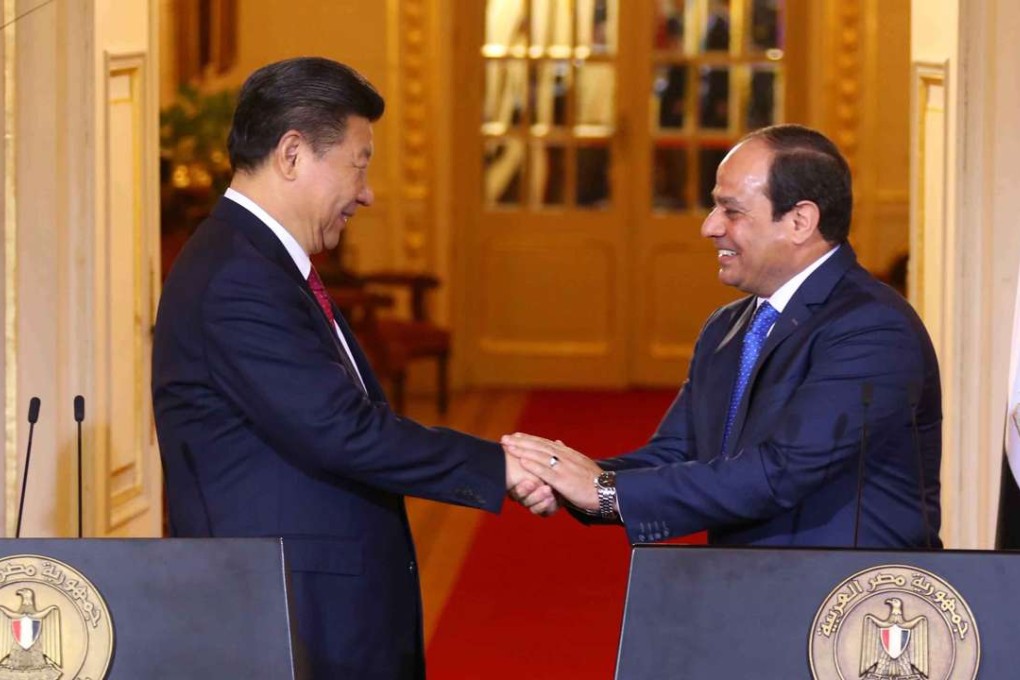 Egyptian President Abdel Fattah al-Sisi (R) and Chinese President Xi Jinping (L) shaking hands at the end of a joint press conference in Cairo, Egypt, earlier in the year. Photo: EPA