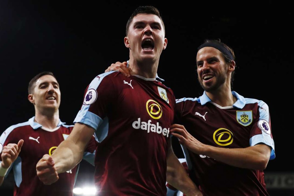 Britain Football Soccer - Burnley v Watford - Premier League - Turf Moor - 26/9/16 Burnley's Michael Keane celebrates scoring their second goal with George Boyd and Stephen Ward Action Images via Reuters / Jason Cairnduff Livepic EDITORIAL USE ONLY. No use with unauthorized audio, video, data, fixture lists, club/league logos or "live" services. Online in-match use limited to 45 images, no video emulation. No use in betting, games or single club/league/player publications. Please contact your account representative for further details.