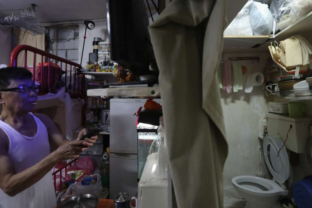 71-year-old Chan, is one of the residents being forced out from a subdivided unit at a industrial building in Kwun Tong. Photo: Bruce Yan