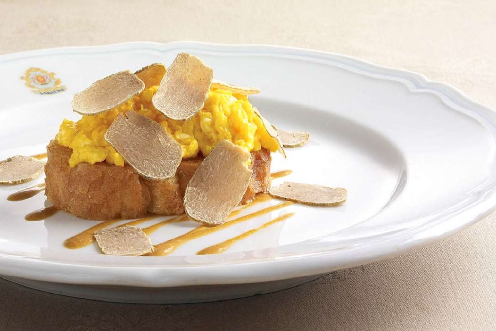 Sabatini’s organic Italian scrambled eggs with toast with shaved white truffle.