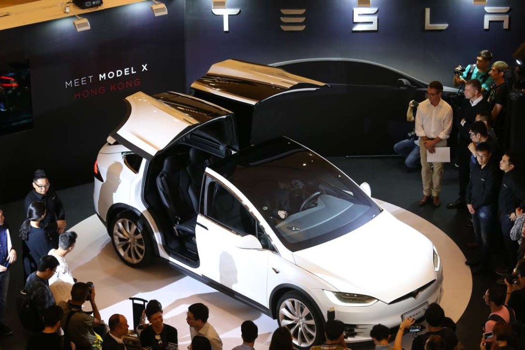 The Model X has falcon-wing doors that open up on either side of the vehicle to give passengers easy access to the second- and third-row seats. Photo: K. Y. Cheng