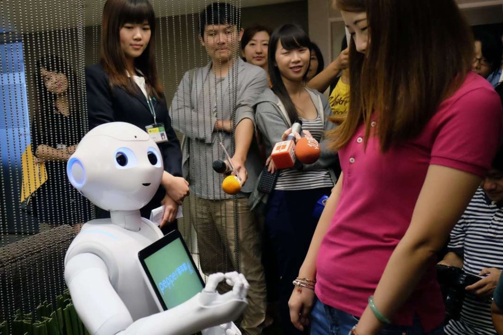 A “Pepper” robot performs during a press conference organised by Cathay Financial Holdings in Taipei on Thursday. Photo: AFP