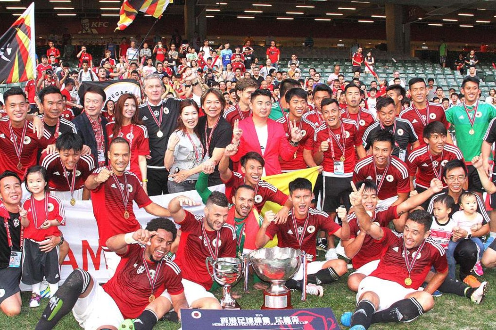 Pegasus players celebrate after winning the FA Cup final over Yuen Long. Photo: Xinhua