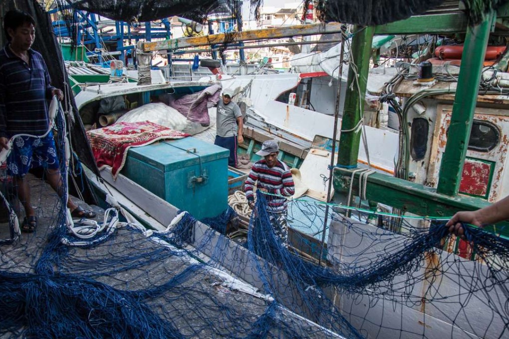 Filippino fishermen at Nanfangao harbour near Yilan, Taiwan. Pictures: Paul Ratje
