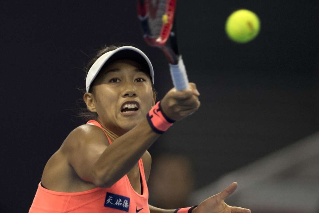 Zhang Shuai returns to Simona Halep at the China Open. Photo: AP