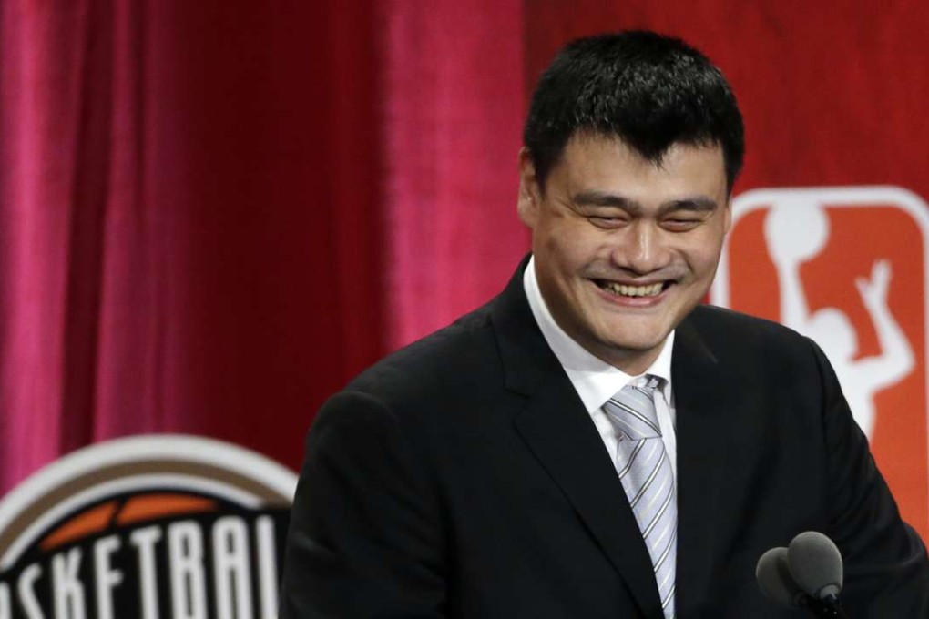 Basketball Hall of Fame inductee Yao Ming speaks during induction ceremonies, Friday, Sept. 9, 2016, in Springfield, Mass. (AP Photo/Elise Amendola)