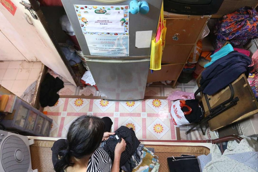 Law in her Cheung Sha Wan rooftop shack, which is at the mercy of the elements. Photo: K. Y. Cheng