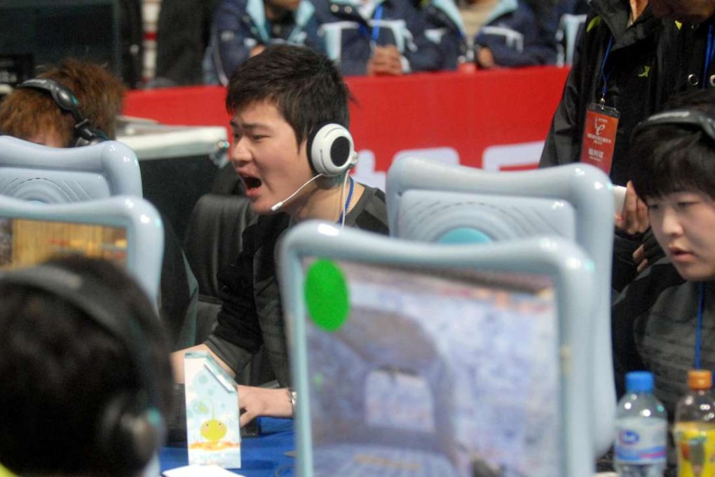 Players compete during e-sports festival held in Wuhan, Hubei province. Photo: Xinhua