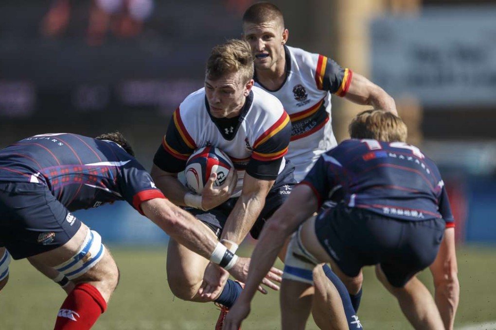 Brad Raper drives forward for HKCC in the HKRU Premiership, which will be shown on Rugby Pass later this month. Photos: HKRU
