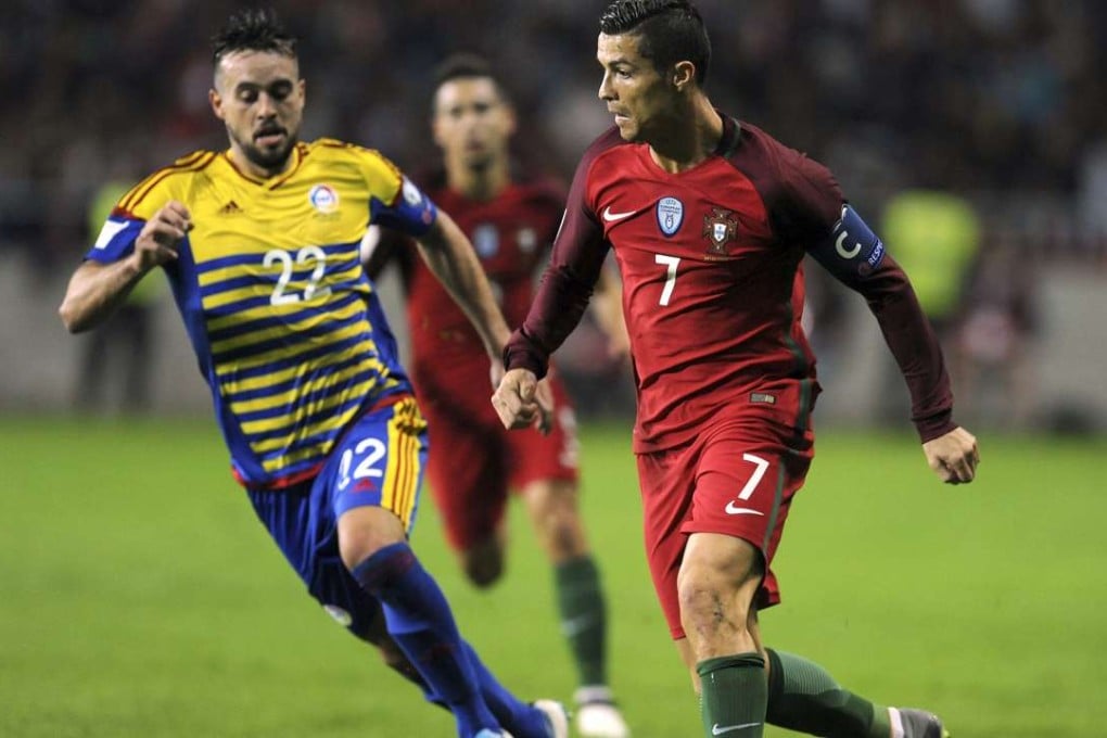 Cristiano Ronaldo takes on Andorra's Victor Rodriguez during their World Cup qualifier. Photo: AP