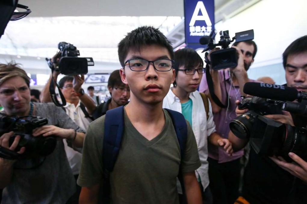 Activist Joshua Wong arrives at the Hong Kong International Airport after being detained by Thai authorities and denied entry to Thailand. Photo: Sam Tsang