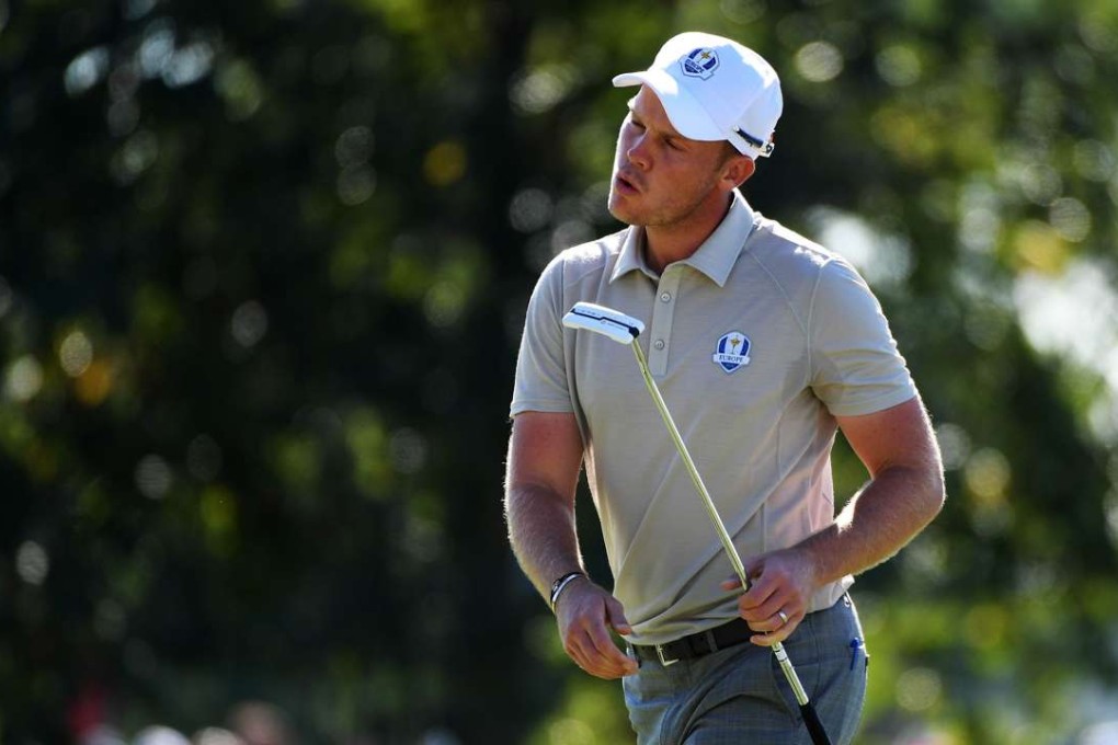 Danny Willett celebrates a putt during the fourball of the Ryder Cup at Hazeltine. Photo: AFP