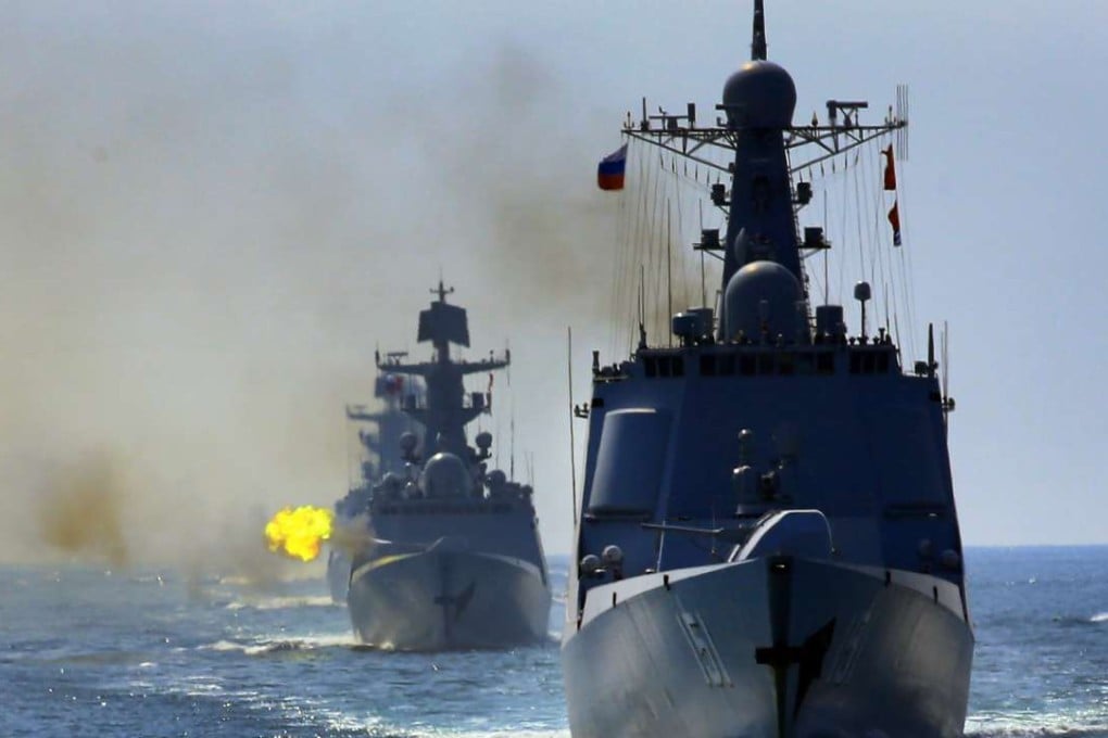 Chinese and Russian ships fire their main guns during a joint naval drill in the South China Sea in September. Photo: Xinhua