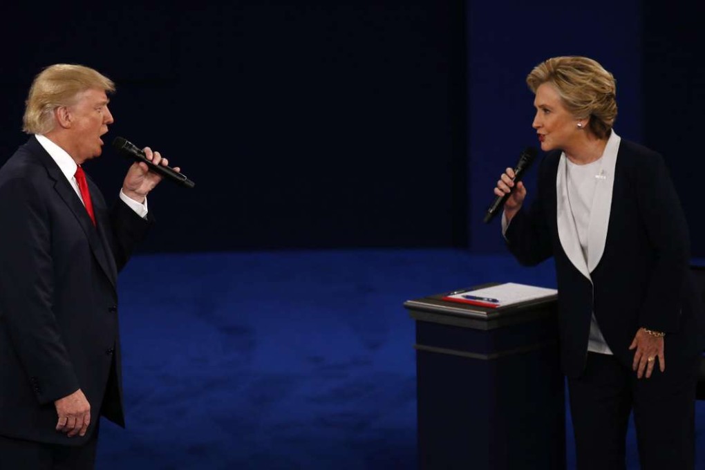 He calls her “the devil”, she calls him not fit to be commander-in-chief. It is a sad day for democracy as Donald Trump and Hillary Clinton face off for the second time, in St Louis, Missouri. Photo: Bloomberg