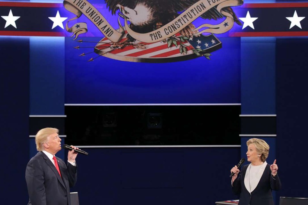 Republican Donald Trump and Democrat Hillary Clinton during the second presidential debate at Washington University in Missouri. Photo: EPA