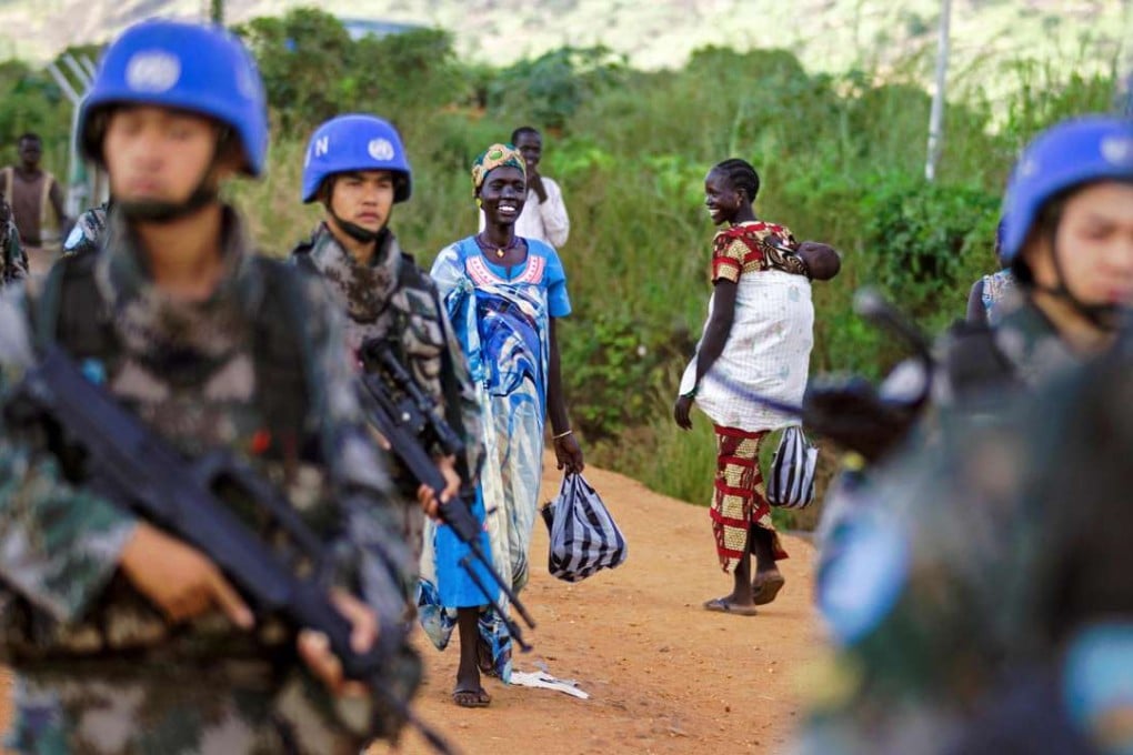 Chinese peacekeeping troops deployed by the United Nations Mission in South Sudan (UNMISS) patrol on foot outside the premises of the UN Protection of Civilians site in Juba, South Sudan. Photo: AFP