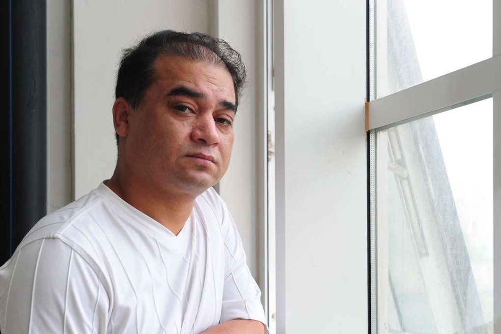 University professor, blogger and champion of Muslim Uygur rights, Ilham Tohti seen in Beijing in 2010. Photo: AP
