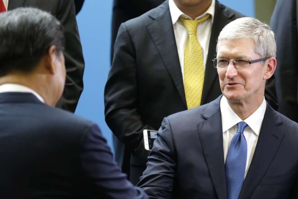 Apple CEO Tim Cook meeting Xi Jinping in September 2015 during the Chinese president’s visit to the Microsoft campus in Richmond, Washington State. Photo: AFP