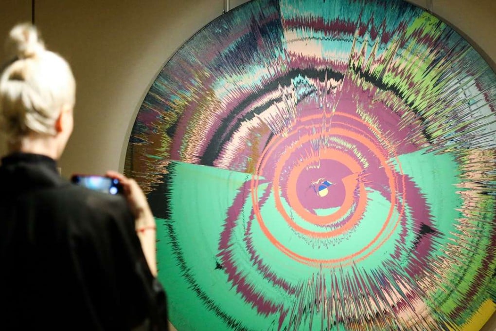 Damien Hirst’s ‘Beautiful, hallo, space-boy painting’, which was owned by David Bowie. Photo: K. Y. Cheng