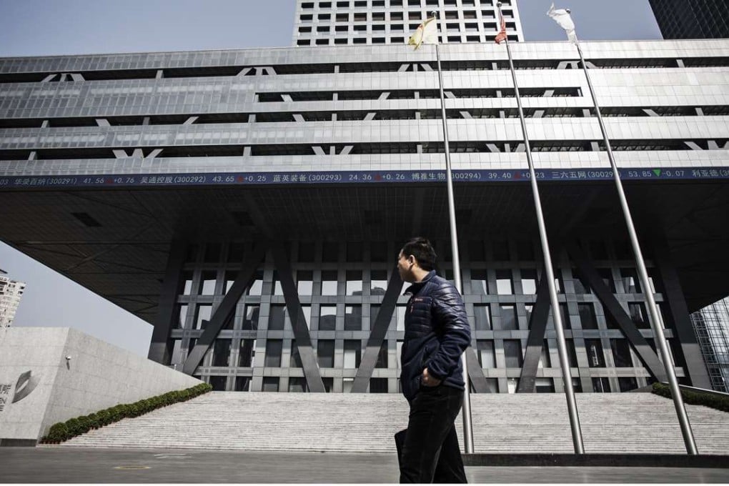 Exterior of the Shenzhen stock exchange building. The stock connect scheme will allow international investors to trade 880 Shenzhen stocks via Hong Kong brokers. Photo: Bloomberg