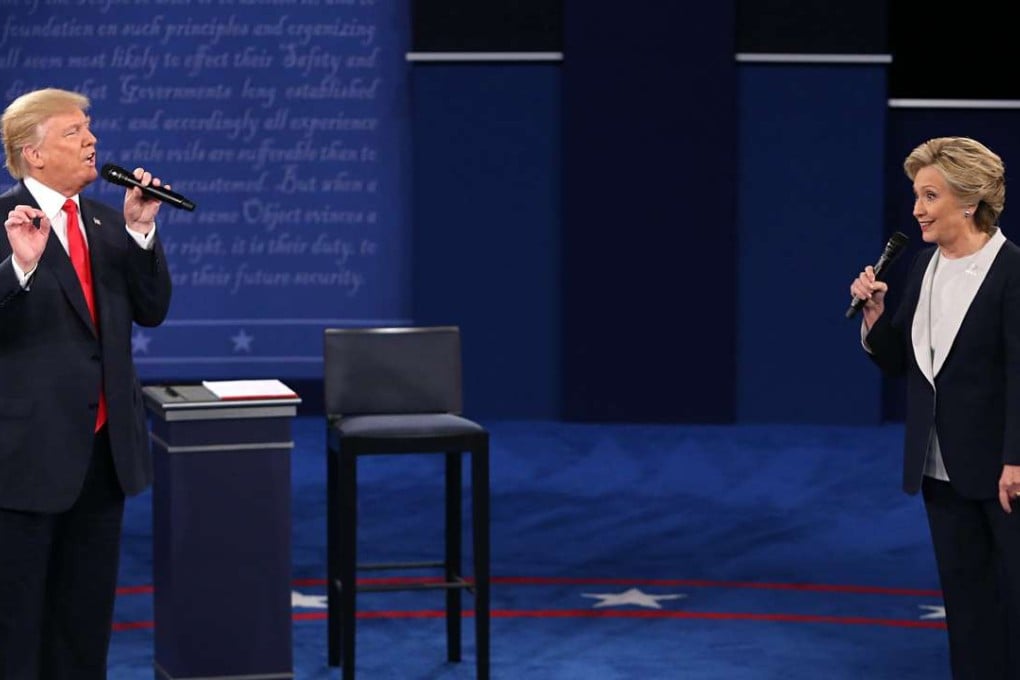 Donald Trump and and Hillary Clinton on stage during the second debate between the Republican and Democratic presidential candidates last Sunday, October 9. Photo:: St. Louis Post-Dispatch/TNS