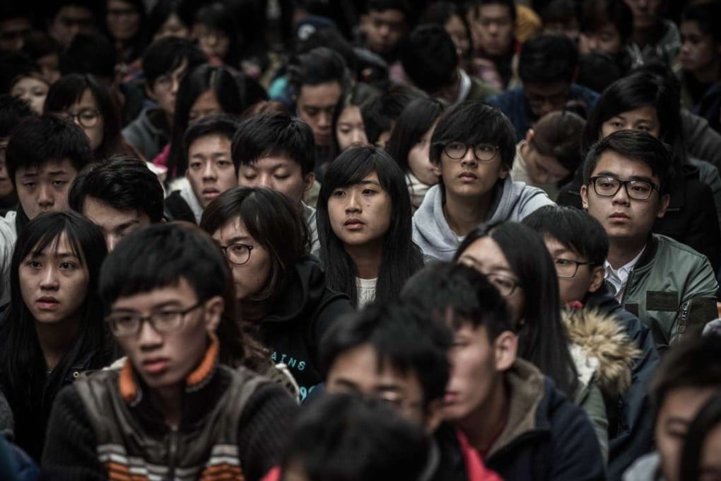 Young people over the past year have shown their disappointment with the Hong Kong government through protests and demonstrations for academic freedom and universal suffrage. Photo: AFP