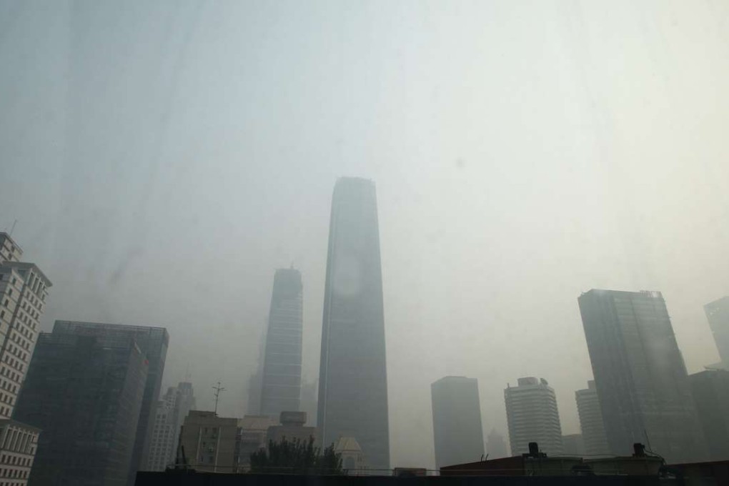 Beijing’s central business district is seen through smog on Friday. Photo: Simon Song