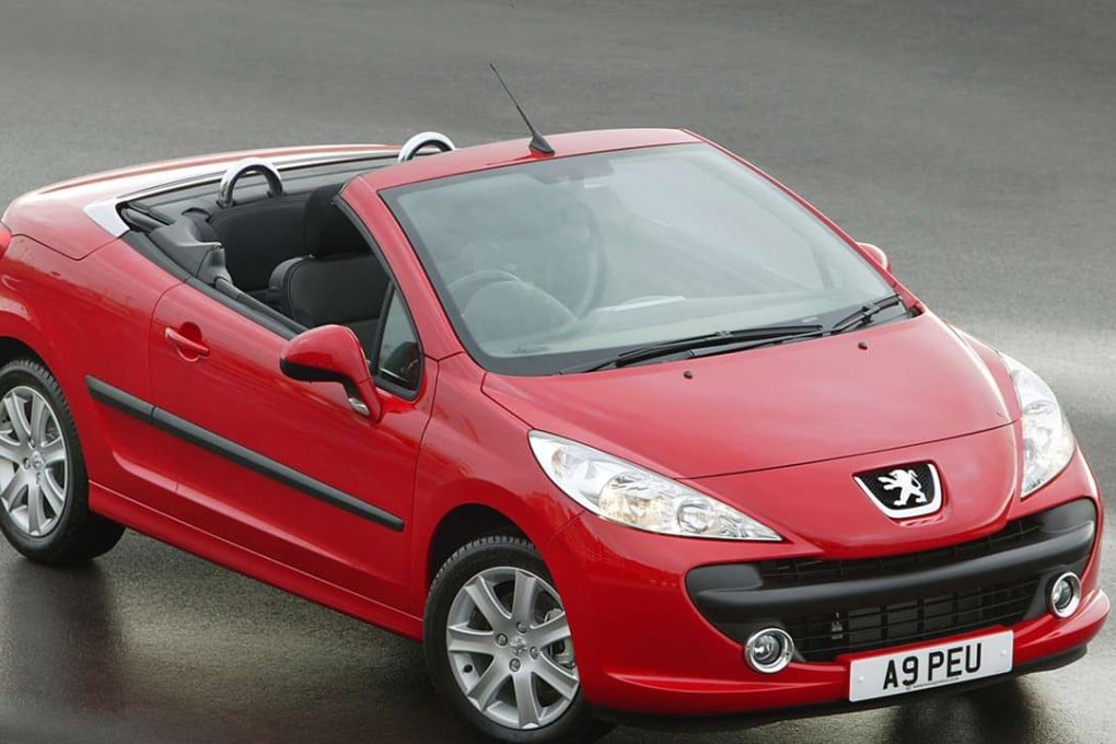 Second-hand convertibles such as the vario-roofed Peugeot 207cc offer open-top fun without the expenses of depreciation and first registration tax. Photo: SCMP Pictures