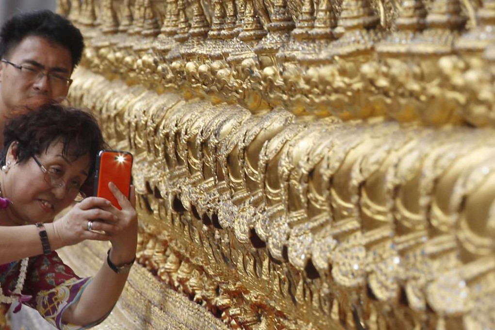 The global ambitions of China’s leading mobile payment providers, Alipay, Tenpay, and Baidu Wallet, are largely reliant on rapid and continued growth in overseas travel by Chinese. Photo: Reuters