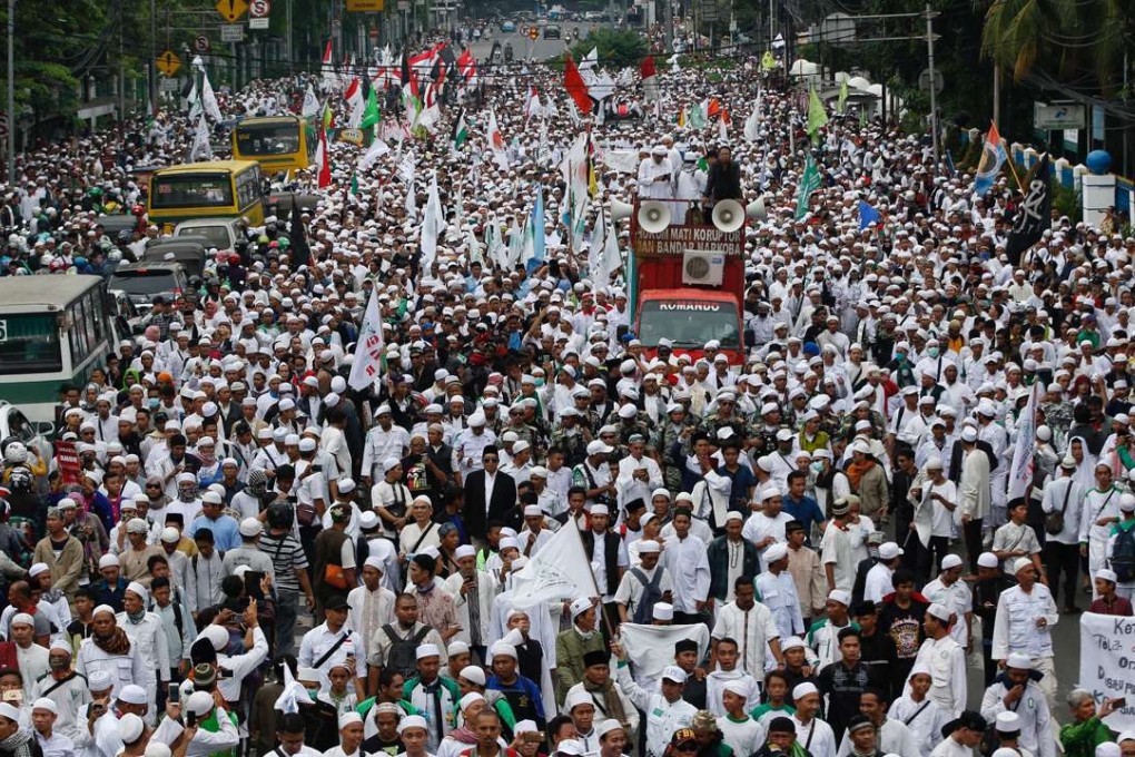 Hardline Muslim groups protest against Jakarta’s incumbent Governor Basuki Tjahaja Purnama, an ethnic Chinese Christian running in the upcoming election. Photo: Reuters