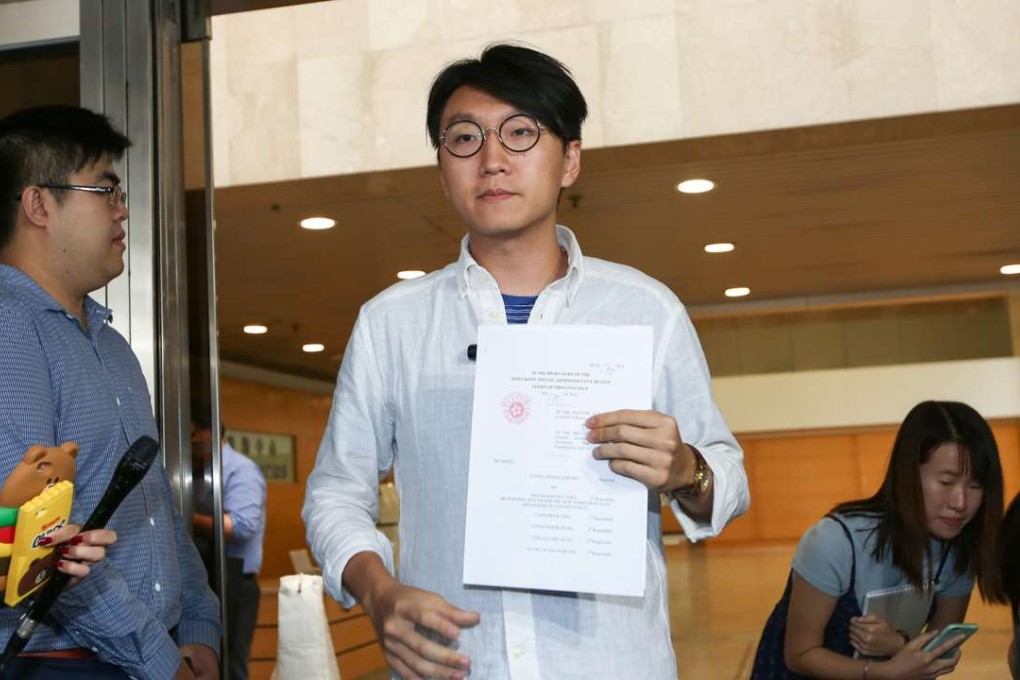Edward Leung Tin-kei, appears at High Court to file a petition against the Electoral Affairs Commission over its decision to disqualify him from running the earlier Legislative Council elections. Photo: Edward Wong