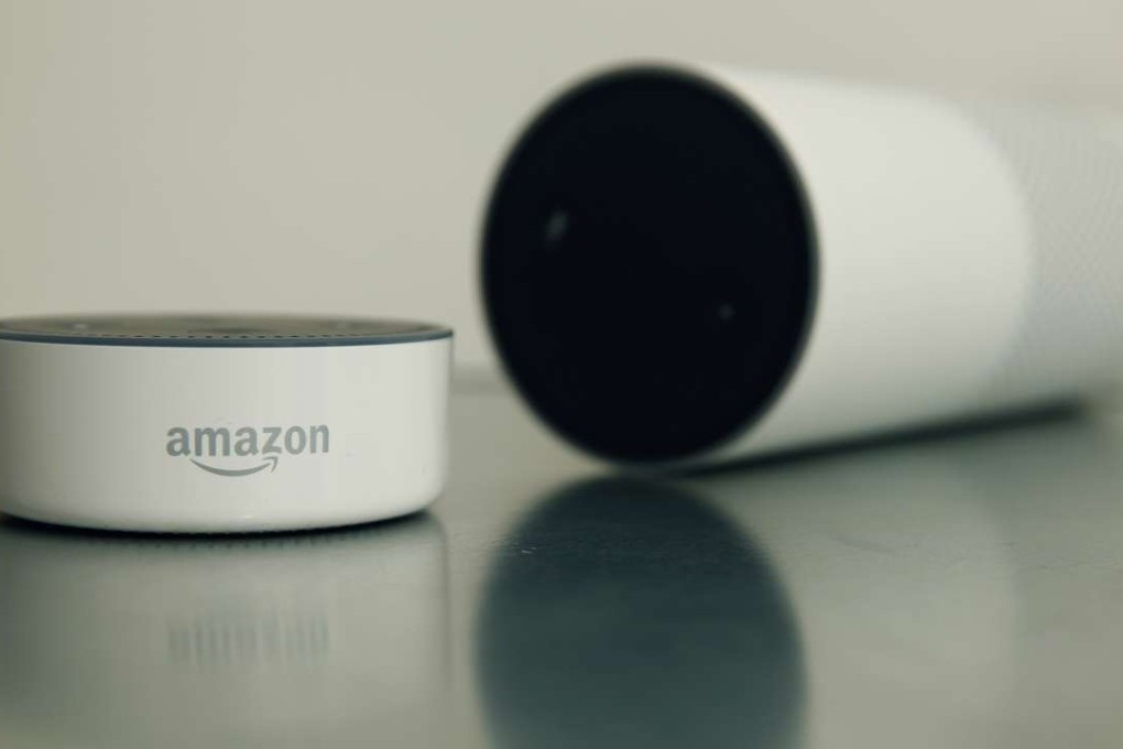 An Amazon Echo Dot, left, and Amazon Echo voice-controlled home assistants. Photo: Bloomberg