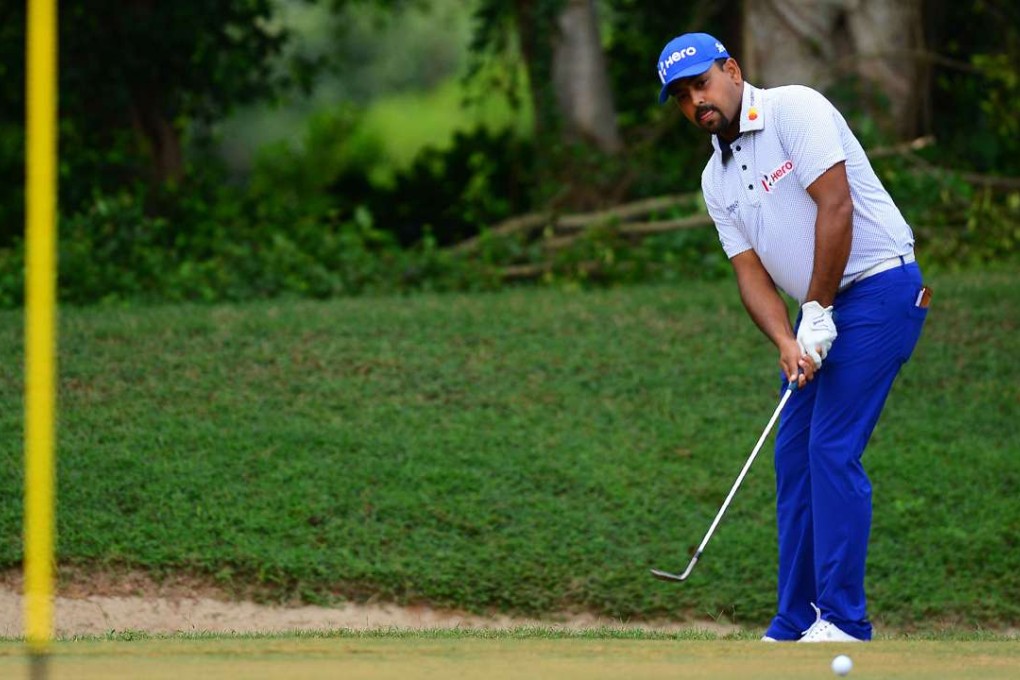 Anirban Lahiri chips on to the green during his three-under 68 in the second round of the Venetian Macao Open. Photos: Asian Tour