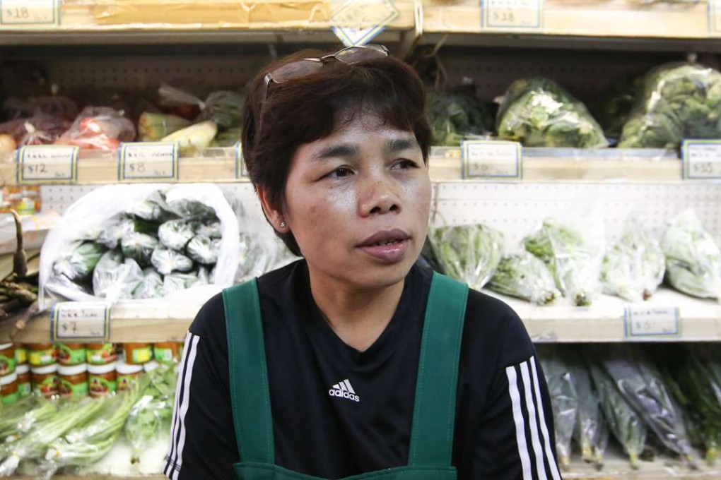 Grocery store trader Jetsadaporn Kesarat says she cries whenever she thinks about the late king. Photo: Edmond So