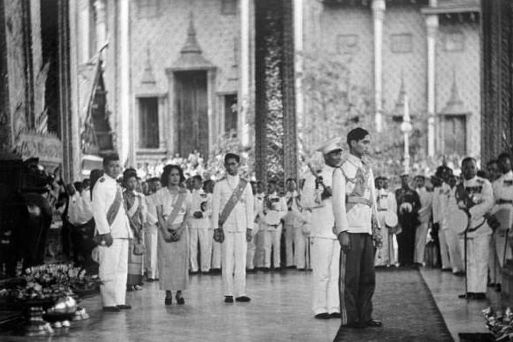 King of Siam Rama VIII or Ananda Mahidol of Thailand stands during an official ceremony on January 1946 in Bangkok after his return from Switzerland to Thailand. Rama VIII born on September 20, 1925 in Heidelberg, Germany, was mostly away pursuing his studies in Switzerland before returning to Thailand in 1945. On June 9, 1946 he was found dead in his bed of a mysterious gunshot wound at the palace in Bangkok. His brother King Bhumibol Adlyadej succeeded him on the throne. / AFP PHOTO