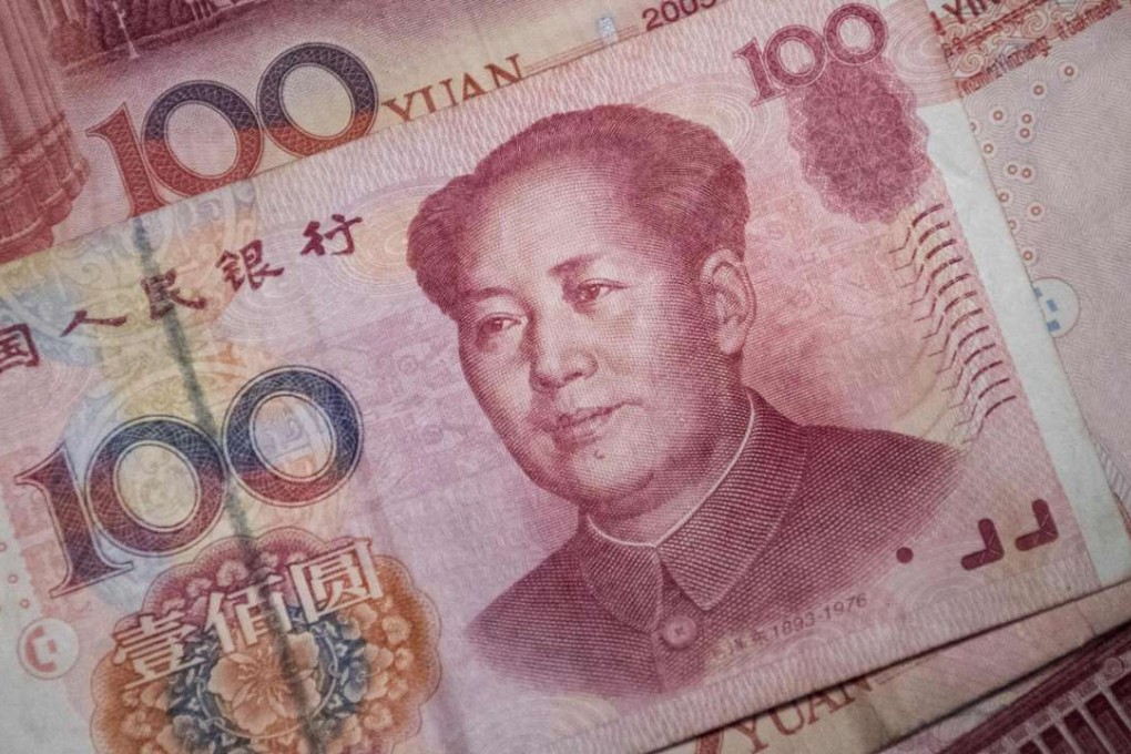 A Chinese 100 yuan note in Beijing. Photo: AFP