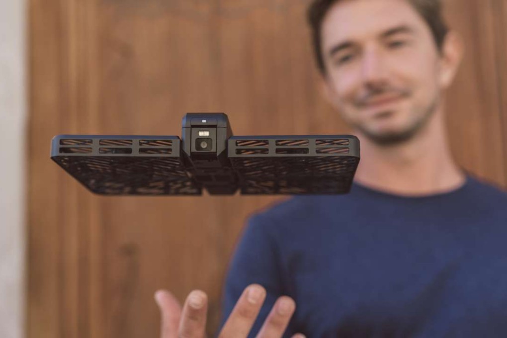 Wang Mengqiu, founder of Zero Zero Robotics, and his Hover Passport in action. Photo: SCMP Handout