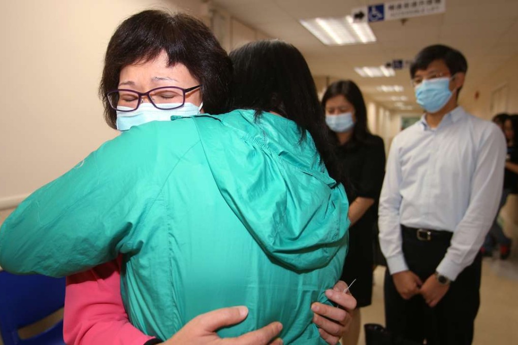 Wife Stella Chu (left) is comforted in Queen Mary Hospital on Saturday. Photo: Xiaomei Chen