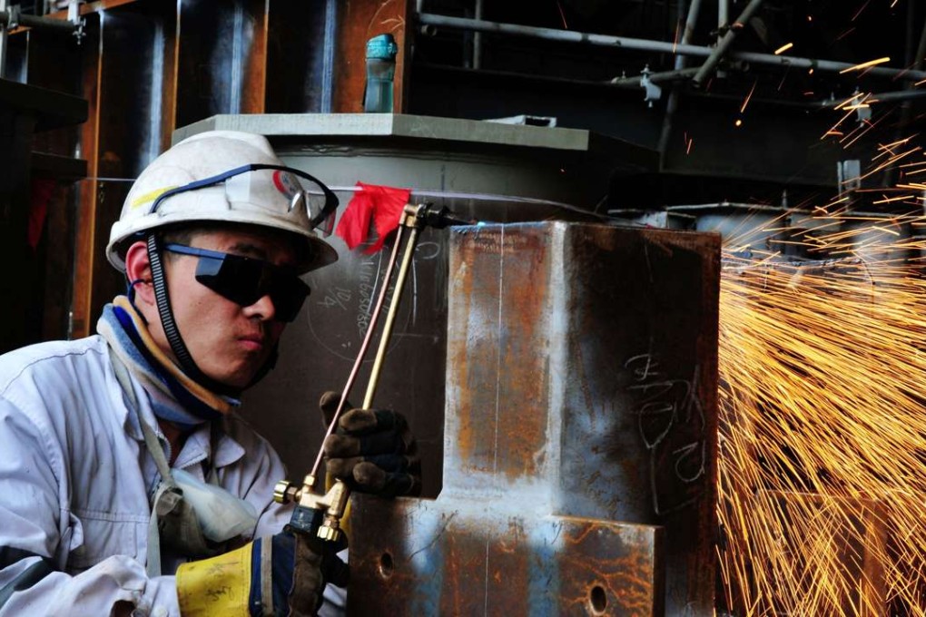 The proportion of manufacturing non-performing loans bought by asset management companies is much lower despite about half of the outstanding loans being in the sector. Photo: AFP