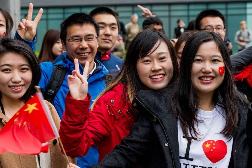 Chinese students at Manchester University during President Xi Jinping’s state visit in Britain in 2015. Photo: AFP