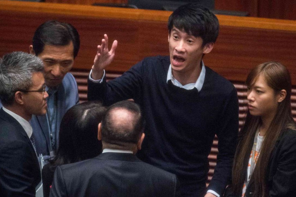 Lawmakers-elect Edward Yiu Chung-yim (back row left), “Baggio” Leung (centre, gesturing) and Yau Wai-ching (right) last Wednesday at Legco. Photo: AFP